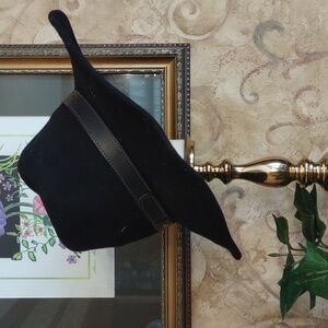 Western style hat, leather belted